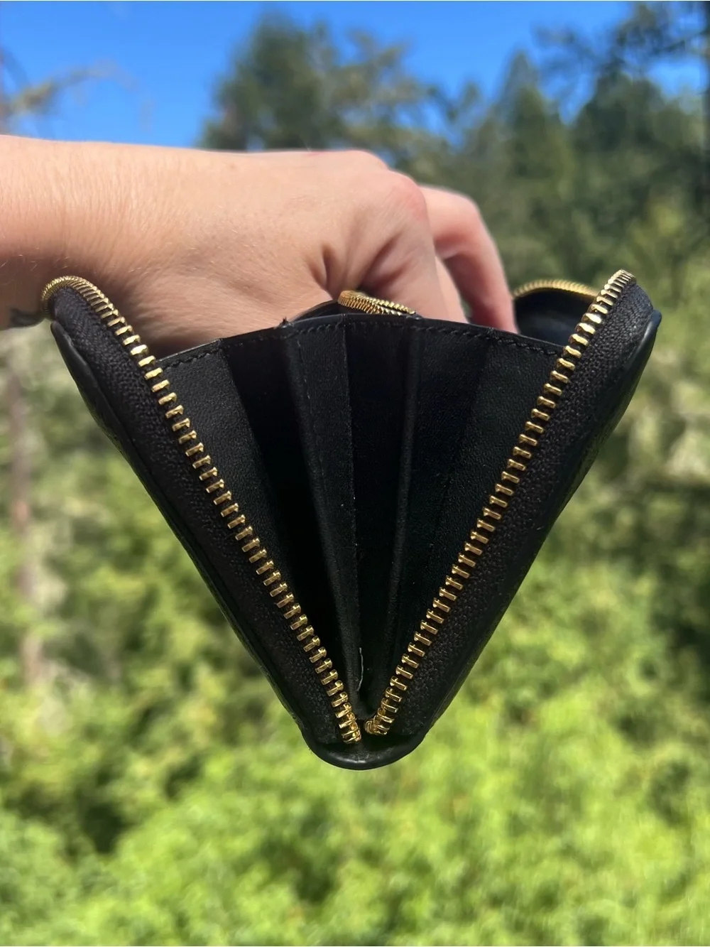 Coach accordion zip